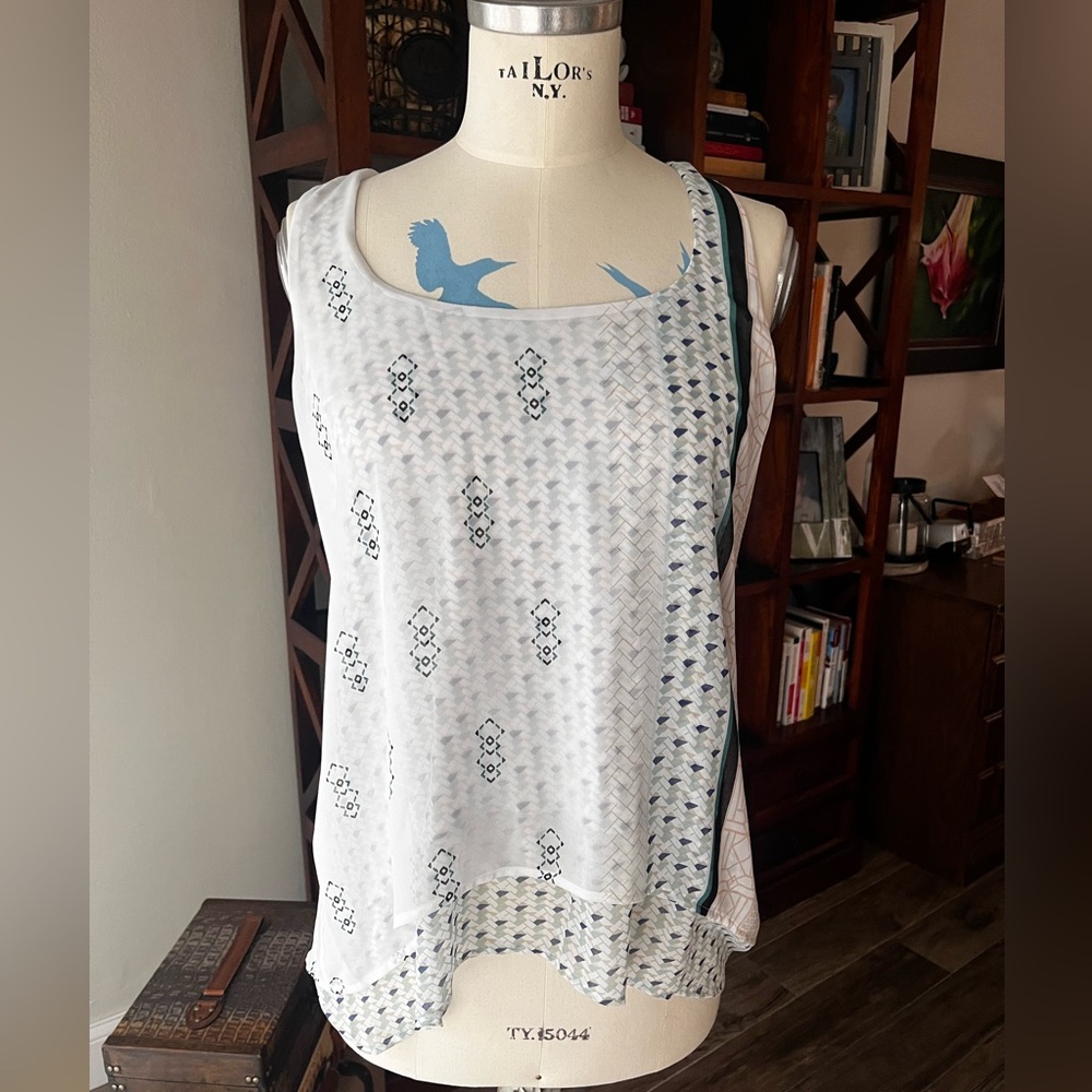 White House Black Market sleeveless layered  top with geometric patterns, Size S
